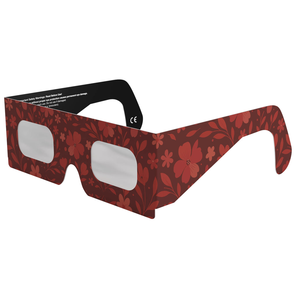Front-side main angle of Bloom eclipse glasses, showcasing their beautiful floral design and flat lenses. CE certified.
