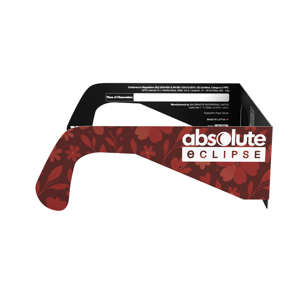 Side profile view of Bloom solar eclipse glasses, highlighting their flat lenses and floral pattern. EU Regulation (EU) 2016/425 compliant.