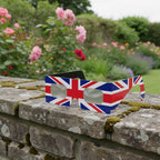 A high-quality still life of GB solar eclipse glasses on a stone wall, showcasing their flat lens design. CE certified.