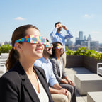 Colleagues at a corporate event on a terrace, wearing Memphis design glasses, looking up in awe, CE certified.