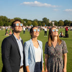 Professionals at a community event wearing Sunburst eclipse glasses, looking up with excitement. CE certified for safety.